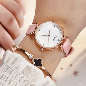 Coffret montre femme à quartz or rose avec bracelet en cuir rose et bracelet trèfle
