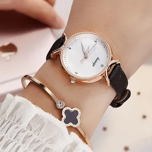 Montre femme tendance or rose avec bracelet en cuir et jonc avec trèfle élégant