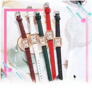 Detailed group shot of five rectangular quartz watches with leather straps and Roman numerals
