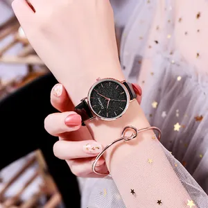 Elegant rose gold starry sky dial ladies watch paired with a stylish knot metal bracelet