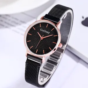 Reloj de cuarzo mujer con esfera cielo estrellado negro y correa imán de oro rosa