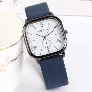 Macro detail of ROSIVGA quartz watch with square silver case and blue leather strap