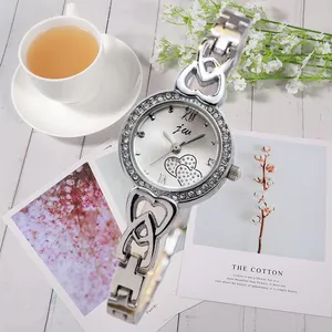 Elegante silberne Damenuhr mit Strass-Herzzifferblatt und hohlem Herz-Kettenarmband