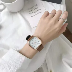 Minimalist square quartz watch with brown leather strap and white roman numeral dial