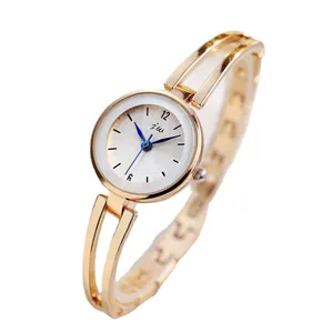 Elegante reloj de pulsera de metal dorado para mujer con esfera blanca y banda hueca