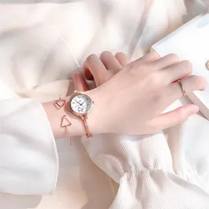 Elegante orologio oro rosa con quadrante balena e set di bracciali geometrici da donna