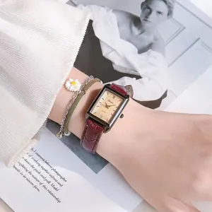 Elegant ladies rectangular quartz watch with deep red crocodile leather strap and gold dial