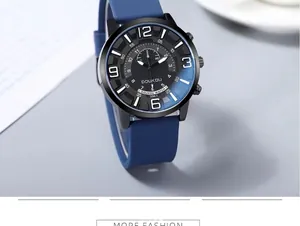 Detail view of large black dial watch with blue silicone strap and metallic buttons