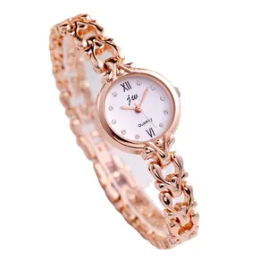 Montre à quartz élégante pour femme en or rose avec strass et bracelet bijou