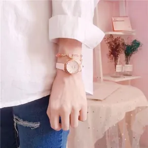 Fashion women's watch with white leather strap and moon pendant bracelet set