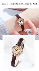 Détail de montre Gedi vintage avec cadran romain or rose et bracelet cuir marron