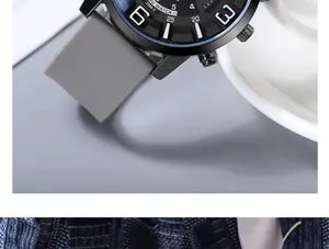Macro shot of sporty black alloy watch case with soft gray silicone strap detail