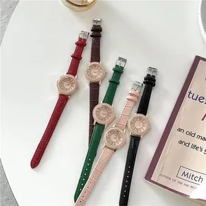 Detail of quartz watches for women with starry diamond bezel and colorful leather straps