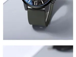 Detail of the black stainless steel case and olive green silicone strap on model 3298-3