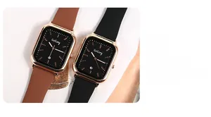 Vue macro détaillée d'une montre rectangulaire pour femme avec cadran noir et dateur