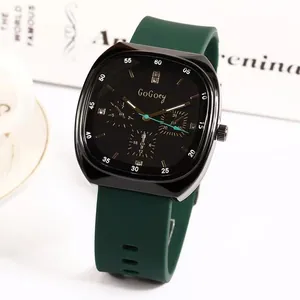 Modern quartz sports watch with a black pillow-shaped dial and green silicone strap