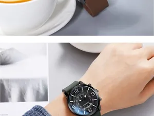 Close-up of stylish men's quartz watch with army green silicone strap and black dial