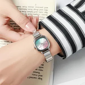 Close-up of a women's square quartz watch featuring a unique blue-pink gradient dial