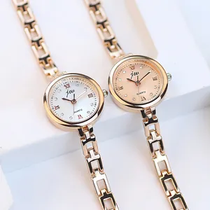 Montres quartz élégantes pour femmes avec bracelet en acier doré et cadran champagne