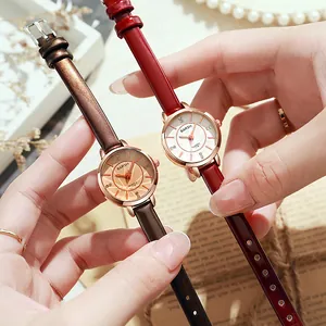 Elegant round quartz watches for women with red and brown leather straps in 45-degree view