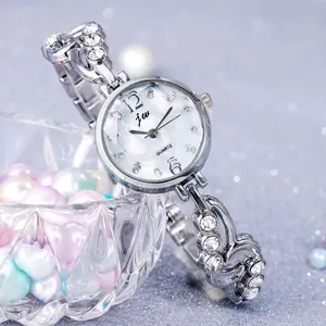 Luxury silver ladies quartz watch with rhinestone hollow bracelet and pearl dial