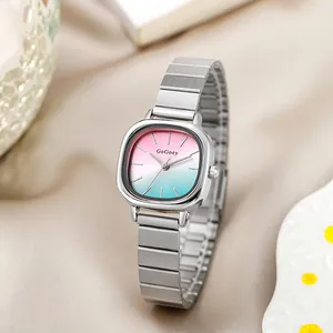 Detail view of square stainless steel watch with pink to blue gradient dial and metal band