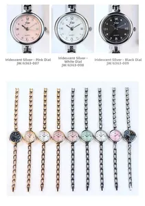 Gros plan d'une collection de montres à quartz pour femmes avec cadrans minimalistes colorés