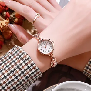 Elegante orologio da donna al quarzo oro rosa con bracciale a maglie circolari