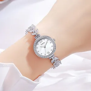 Montre bracelet élégante en argent pour femme avec queue de sirène et cristaux scintillants
