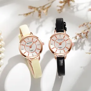 Elegant women's quartz watch with slim leather strap and crystal-studded round dial