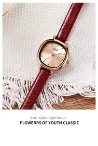 Macro detail of Gedi women's quartz watch with rose gold dial and red leather strap