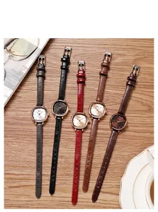 Flat lay of vintage square quartz watches with slim leather straps in five colors