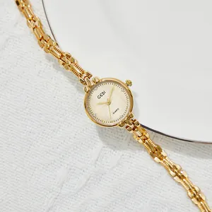 Elegante orologio da donna al quarzo dorato vintage con quadrante minimal e cinturino in metallo