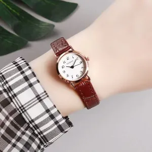 Women's minimalist quartz watch with rose gold case, white dial and brown leather strap