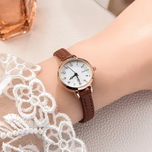 Elegant women's quartz watch with rose gold case, white dial and brown leather strap