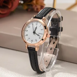 Elegant women's quartz watch with rose gold case, minimalist white dial, and black leather strap