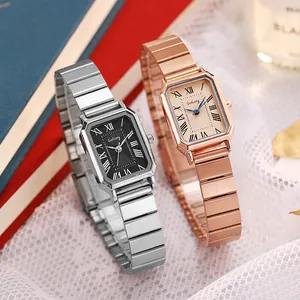 Macro detail of rectangle quartz watches with Roman numerals on elegant metallic bands