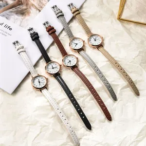 Detailed arrangement of five chic women's quartz watches with assorted leather straps