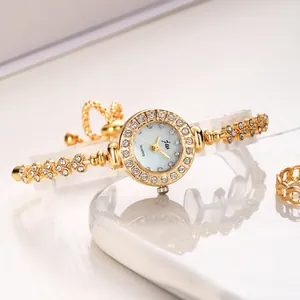 Montre Bracelet de Mode pour Femmes avec Strass Mouvement à Quartz Élégante Chaîne en Métal Réglable Cadeau Bijoux