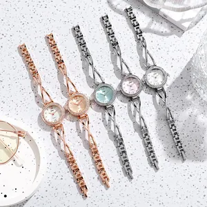 Detailed close-up of luxury women's quartz watches with sparkling rhinestone bezels