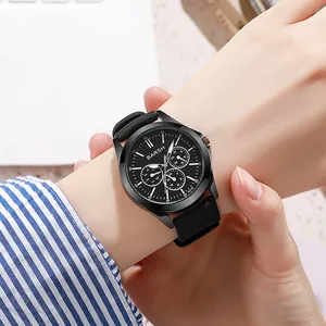 Minimalist all-black quartz sports watch with silicone strap and three-eye chronograph style