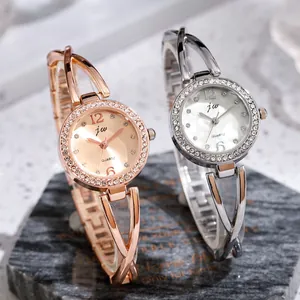 Elegant ladies quartz wristwatches with rhinestone bezel and hollow metal bracelet band