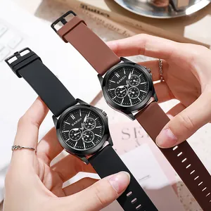 Detail of BARSH fashion watches with black and brown silicone straps and chronograph dials
