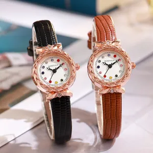Elegant rose gold ladies watch with crystal markers and leather strap in two colors