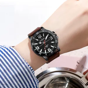 Men's sports quartz watch with black dial and brown leather strap on a striped shirt