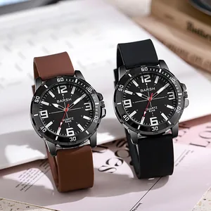 Detailed close-up of fashion quartz watches with black silicone straps and alloy case