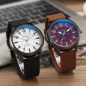 Fashionable men's quartz watch with large dial and silicone strap on wooden desk