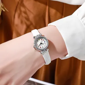 Detailed close-up of ROSIVGA watch with silver carved bezel and gemstone dial markers