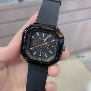 Fashionable black octagonal quartz watch with silicone strap and three functional sub-dials