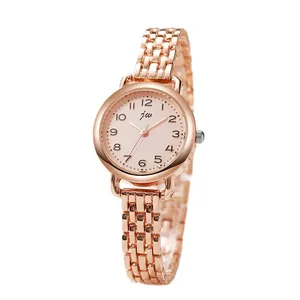 Montre femme or rose avec cadran à chiffres arabes et bracelet à maillons fins